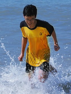 running on the beach fully clothed